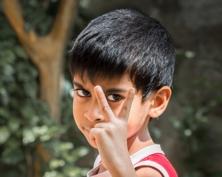 Kid showing emotion of desire to win