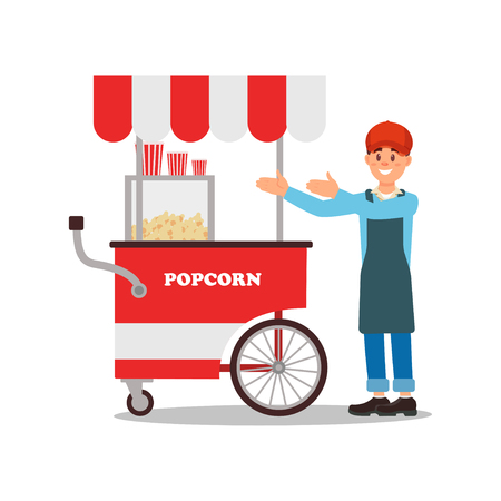 Friendly seller standing near mobile popcorn cart. Street food trolley. Young smiling man in cap and apron. Flat vector designのイラスト素材