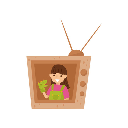 Adorable smiling girl sitting in TV made of cardboard box and playing with toy dragon on hand. Cartoon character of cheerful little kid. Colorful flat vector illustration isolated on white background.のイラスト素材