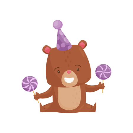 Smiling little bear in party hat, sitting on floor and holding sweet purple lollipops in paws. Cute humanized animal. Cartoon character of forest creature. Flat vector isolated on white background.のイラスト素材