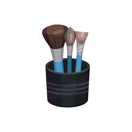 Set of three different professional makeup brushes in small black cup. Cosmetic tools. Beauty industry. Colorful illustration in flat style isolated on white background. Cartoon vector design.のイラスト素材