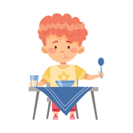 Boy Character Sitting at Table Eating Porridge for Breakfast Vector Illustrationのイラスト素材