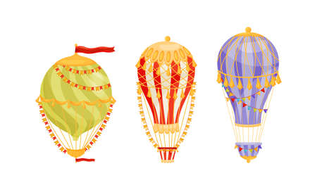 Hot Air Balloon as Light Aircraft with Envelope and Gondola Decorated with Flag Garland and Tassels Vector Setのイラスト素材