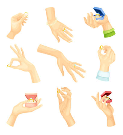 Male and female hands with golden rings set. Engagement or wedding design element vector illustrationのイラスト素材