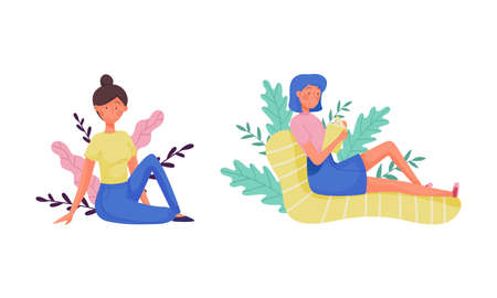 Young Woman Sitting in Foliage and Reading Book Vector Setのイラスト素材