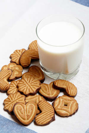 Cookies  and  glass of milk. Selective focus on cookiesの写真素材