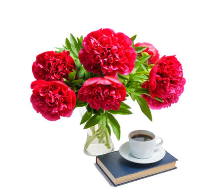 Beautiful red peonies in glass vase isolated on whiteの写真素材