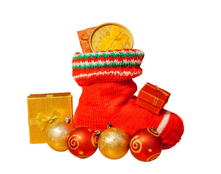 Christmas stocking with presents and christmas balls isolated on white background. Selective focus