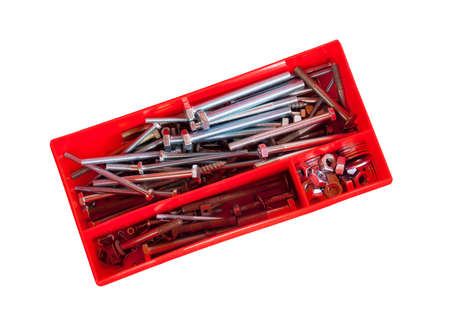 Screws and bolts in box isolated on white backgroundの写真素材