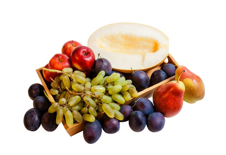 Fruits on wooden tray isolated on white backgroundの写真素材
