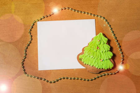 Greeting card with gingerbread cookie. Top view.の写真素材