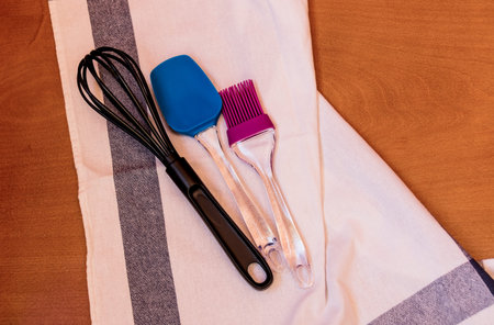Kitchen baking utensils on wooden backgroundの写真素材