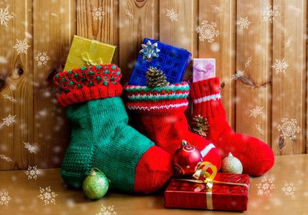 Christmas stockings on wooden background