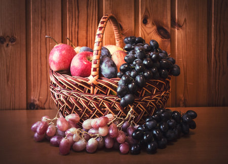 Fresh fruits in basket. Selective focus.