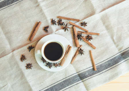 Coffee cup and spices on  table. View from aboveの写真素材