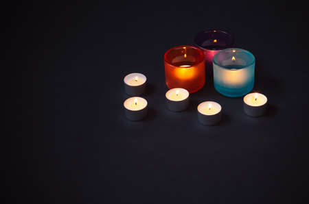 Candles on dark background. View with copy space.の写真素材