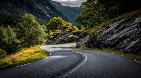 Scenic Mountain Road Winding Through Verdant Landscape: A Journey into Nature's Embraceの素材