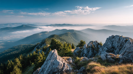 Breathtaking Mountain Vista with Rolling Hills and Morning Mistの素材