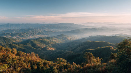 Majestic mountain range landscape view with morning mist and skyの素材