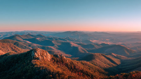 Mountain Vista Landscape Bathed in the Warm Glow of Sunset Lightの素材