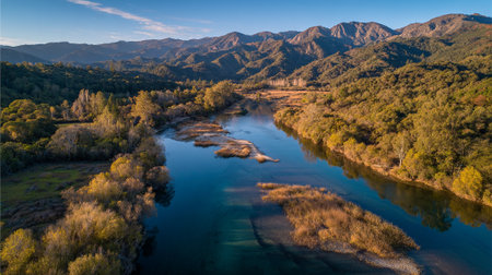 Serene River Valley Landscape with Mountains and Autumnal Trees, Beautiful Sceneryの素材