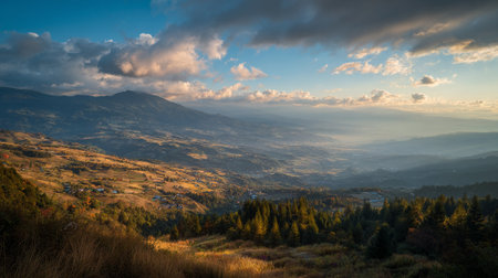 Beautiful Landscape of Mountains and Valley at Sunset with Dramatic Skyの素材