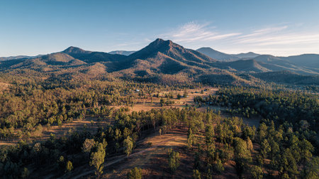 Dramatic Landscape of Rolling Hills and Valleys at Golden Hourの素材