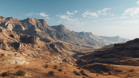 Majestic Mountain Range Landscape Under a Partly Cloudy Skyの素材