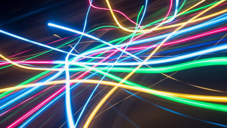abstract colorful light trails on black background, computer generated abstract backgroundの素材