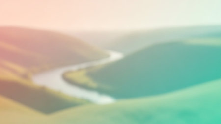 Abstract blurred background. Beautiful summer landscape with mountains, river and sky.の素材