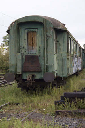 Abandoned, old train alone on the rails