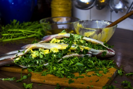 Two raw trouts on the kitchen table, ready to cookの写真素材