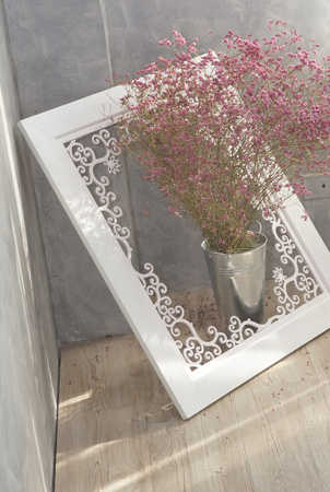 The Vest of Pink Flowers inside the White Frameの写真素材