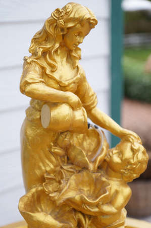 Golden woman statueの写真素材