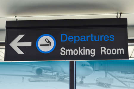Signage for smoking room at airportの写真素材