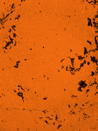 Abstract grunge black and orange distressed texture as backgroundの写真素材