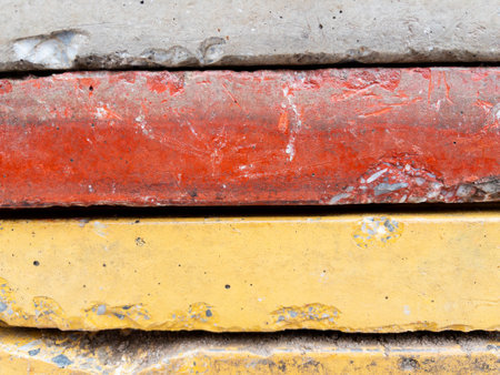 Red yellow stone block wall background textureの写真素材
