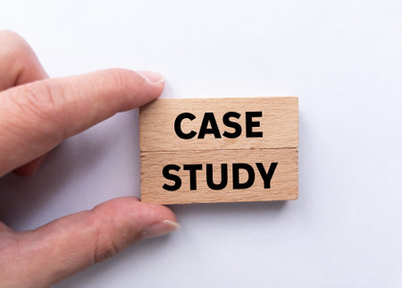 Case study message written on wooden blocks on white background. Conceptual case study symbol. Copy space.の写真素材