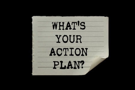 What's your action plan message written on torn torn paper piece on black background. Conceptual what's your action plan symbol. Copy space.の写真素材