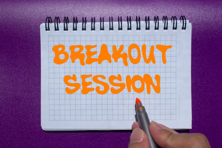 Breakout session message written on notebook page on purple background. Conceptual breakout session symbol. Copy space.の写真素材