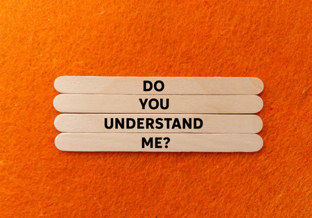 Do you understand me message written on wooden sticks on orange background. Conceptual do you understand me symbol. Copy space.の写真素材