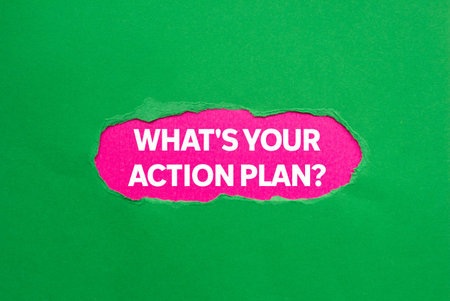 What's your action plan message written on torn green paper on pink background. Conceptual what's...