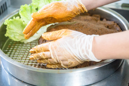 woman making Ã§iÄŸ kÃ¶fte raw meatballs