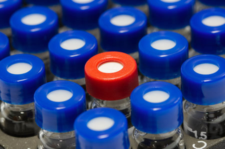 High performance liquid chromatograph, HPLC, glass vials in the rack. Research and development of...