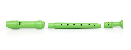 Green block flute isolated on white background