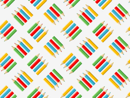 Seamless background with colored pencils in four colors, illustration on the theme of schoolのイラスト素材