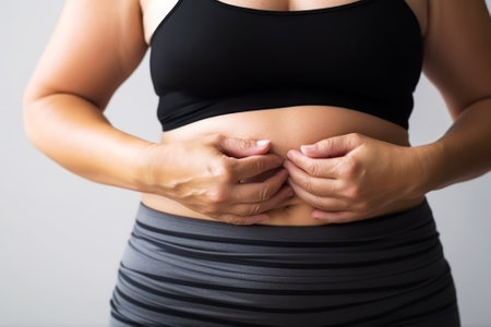 abdominal pain, woman pressed her hands to her stomach generative ai.の素材