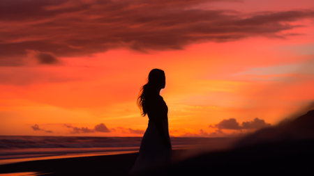silhouette of a girl on the background of the sea sunset sky generative ai.の素材
