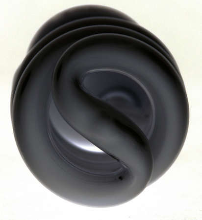 The end of a coiled lightbulb, invertedの写真素材