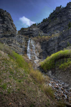 Bridalveil Falls, Provo Canyon, Utah, with blue skies in background during springtime.の写真素材